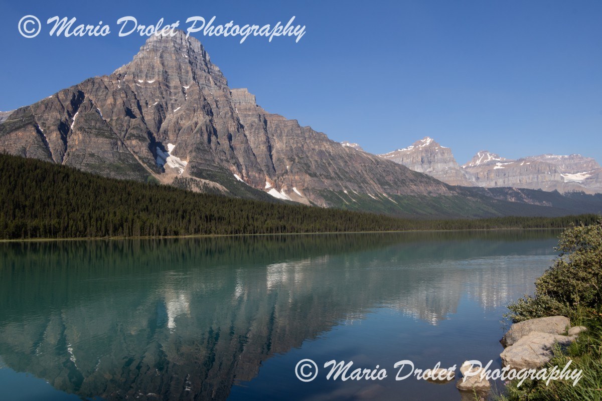 Howse Peak and Waterfowl Lake in the morning sun in Banff National Park, Alberta Canada