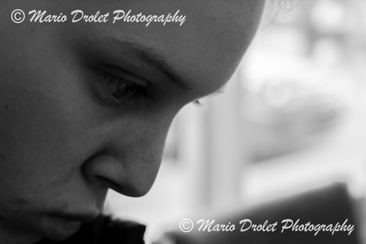 A person's face profile in black and white