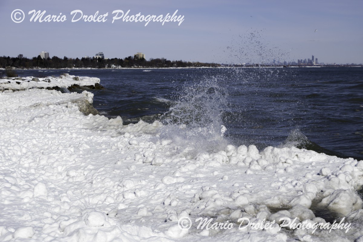 Waves crashing on the icy shores of Lake Ontario