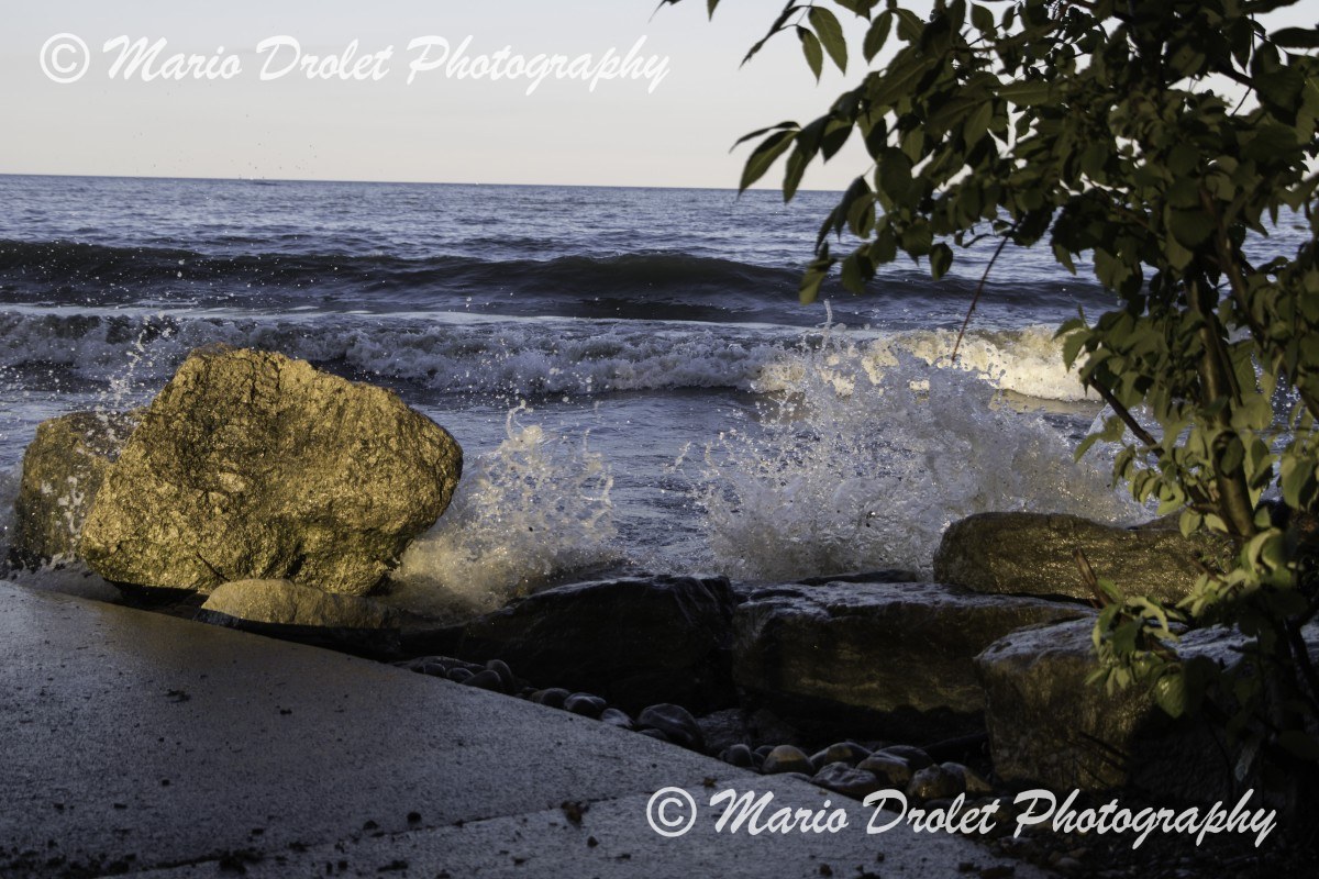Water splashing on a rock on the shores of Lake Ontario