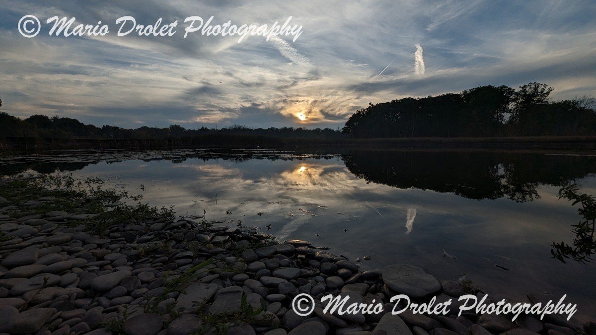Fall sunset over a rocky beach in Rattray Marsh Southern Ontario